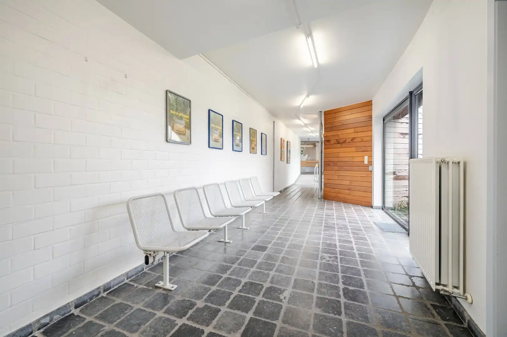 Ruim veelzijdig handelspand met woonst in hartje Kruisem foto 8