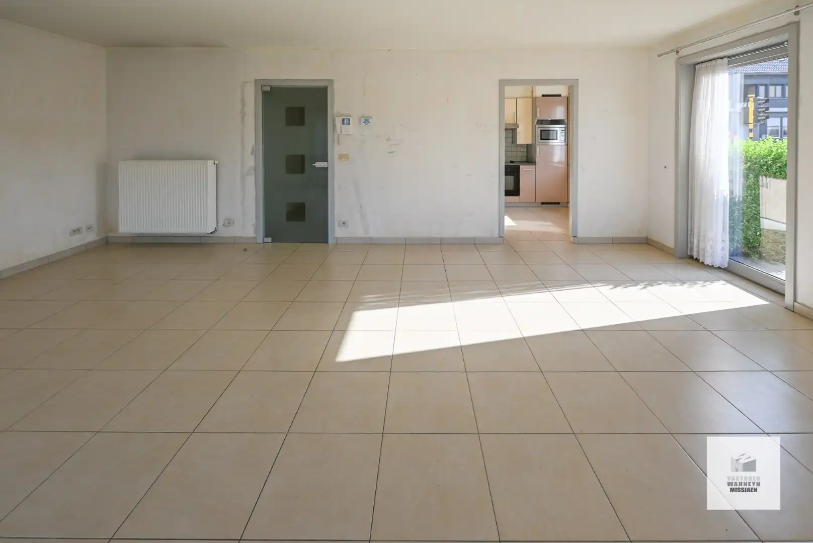 Ruim gelijkvloers appartement met 2 slpk en zonnige tuin/terras foto 4