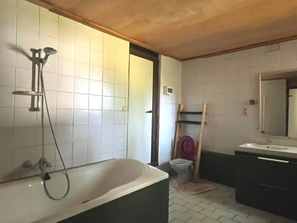 Volledig te verbouwen/slopen woning (bouwgrond) met 3 slaapkamers, inpandige garage, tuin en garagebox op een perceel van 1.154m² foto 10