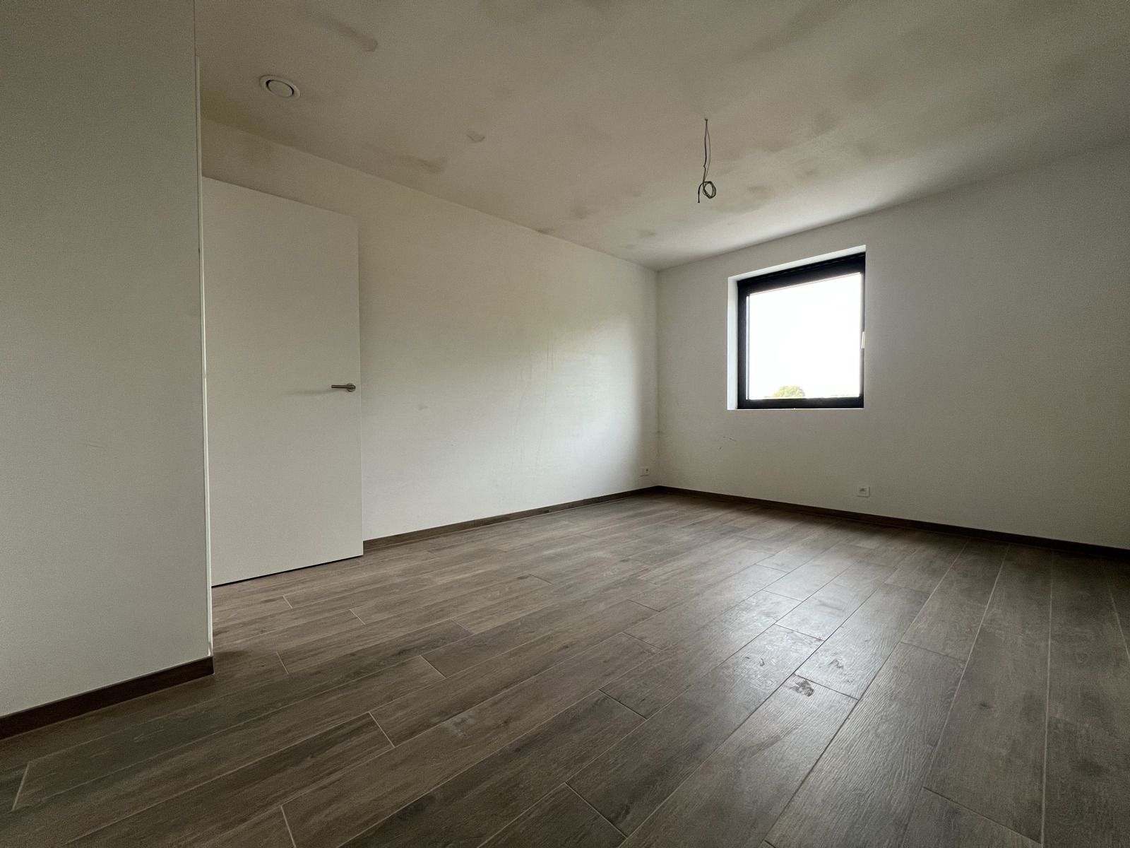 Te huur - Nieuwbouwwoning met  zonnige tuin en carport foto 7