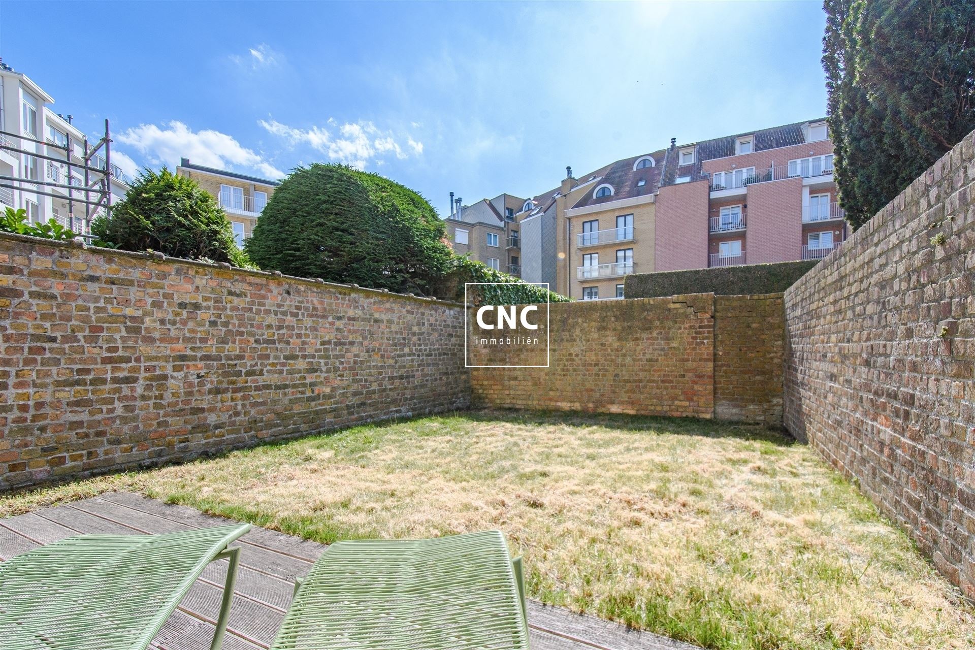 Gelijkvloers appartement met zonnige tuin nabij het centrum
 foto 13