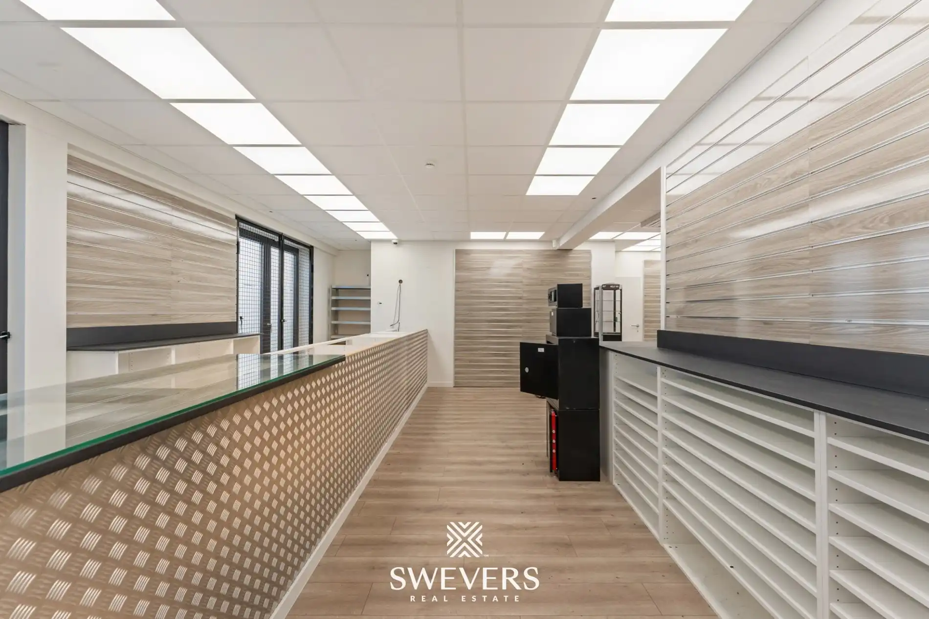 Uitzonderlijke mooi gelegen en ruime (391m²) handelsruimte in het volle centrum van Leopoldsburg foto 21