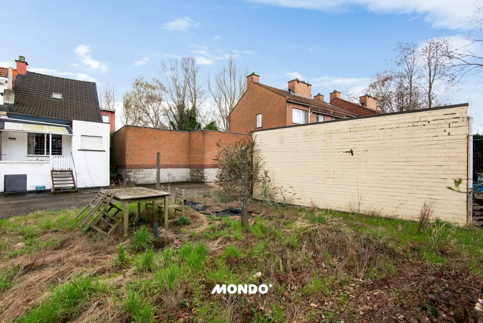 Te renoveren woning met tuin en garage op rustige ligging in Boom foto 4