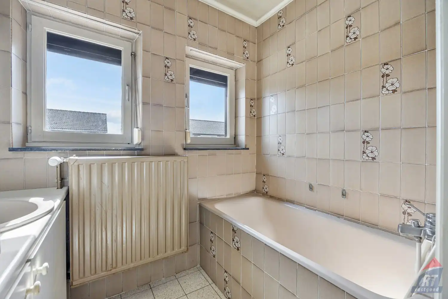Rustig gelegen, op te frissen woning in Alken foto 13