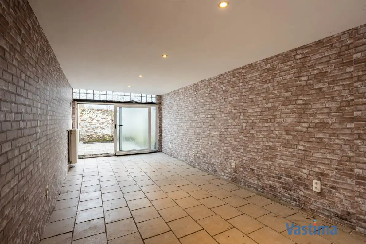 Op te frissen woning met potentieel in Erembodegem foto 6