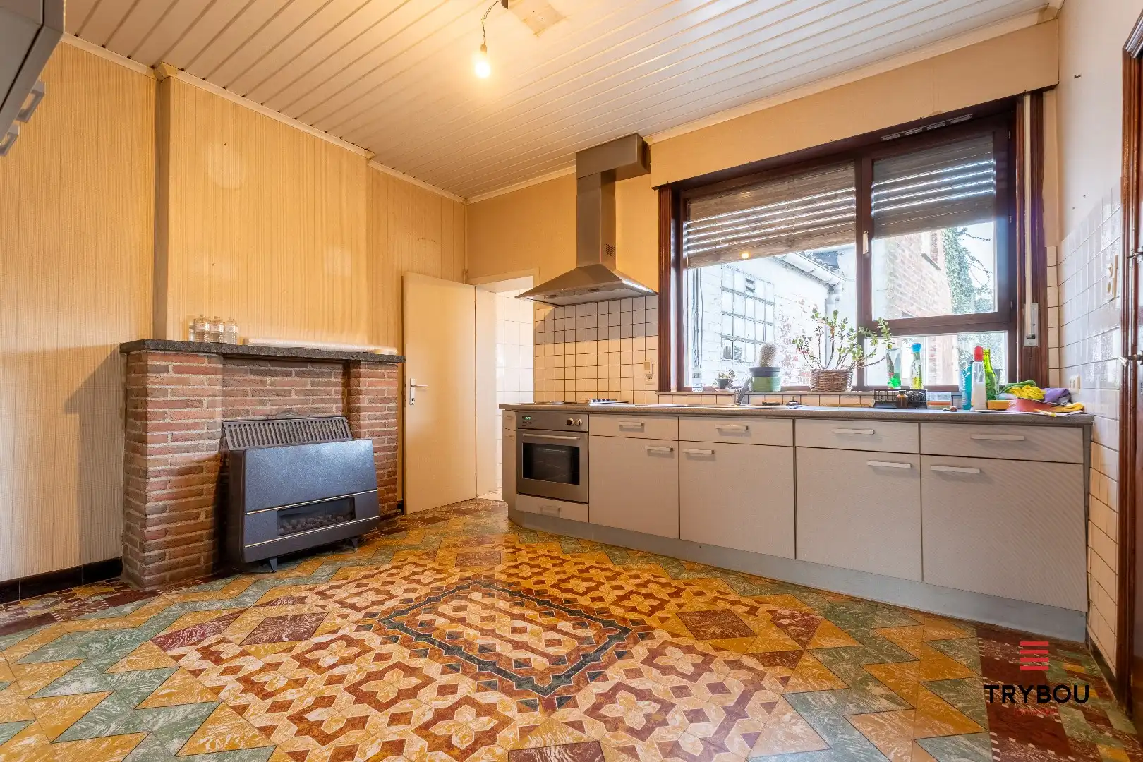 Te renoveren woning met garage en diepe tuin foto 5