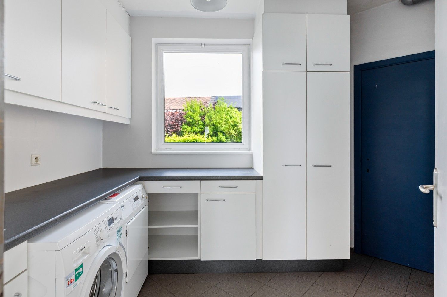 Ruime halfopen bebouwing met zuidwest georiënteerde tuin te Lint foto 9