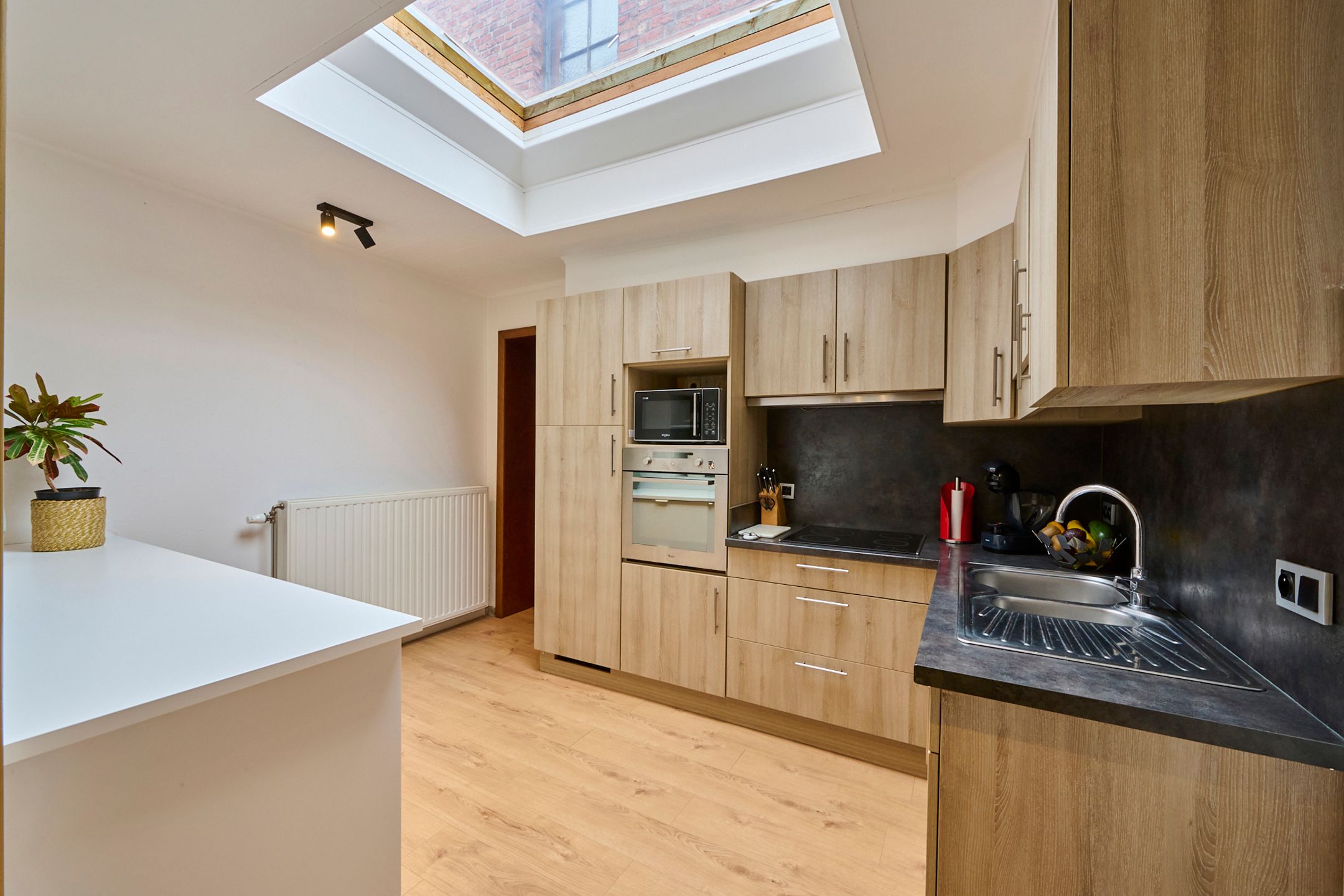 Gerenoveerde energiezuinige stadswoning + polyvalente ruimte foto 6