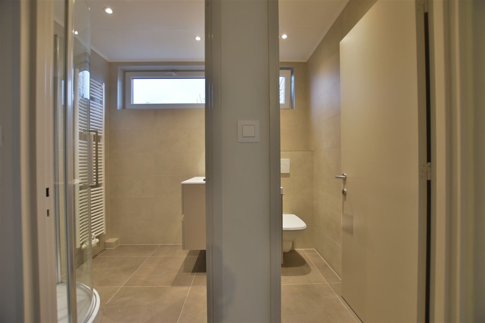 Totaal gerenoveerd GV appartement met tuin te Grembergen foto 20