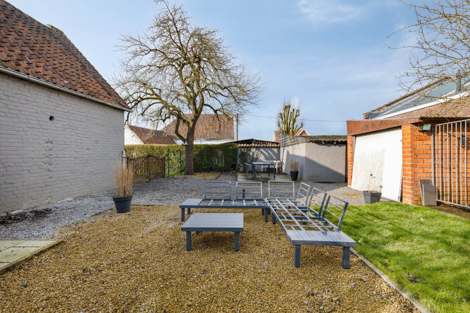 Te renoveren woning  met 3 slaapkamers en tuin in Lochristi. foto 19