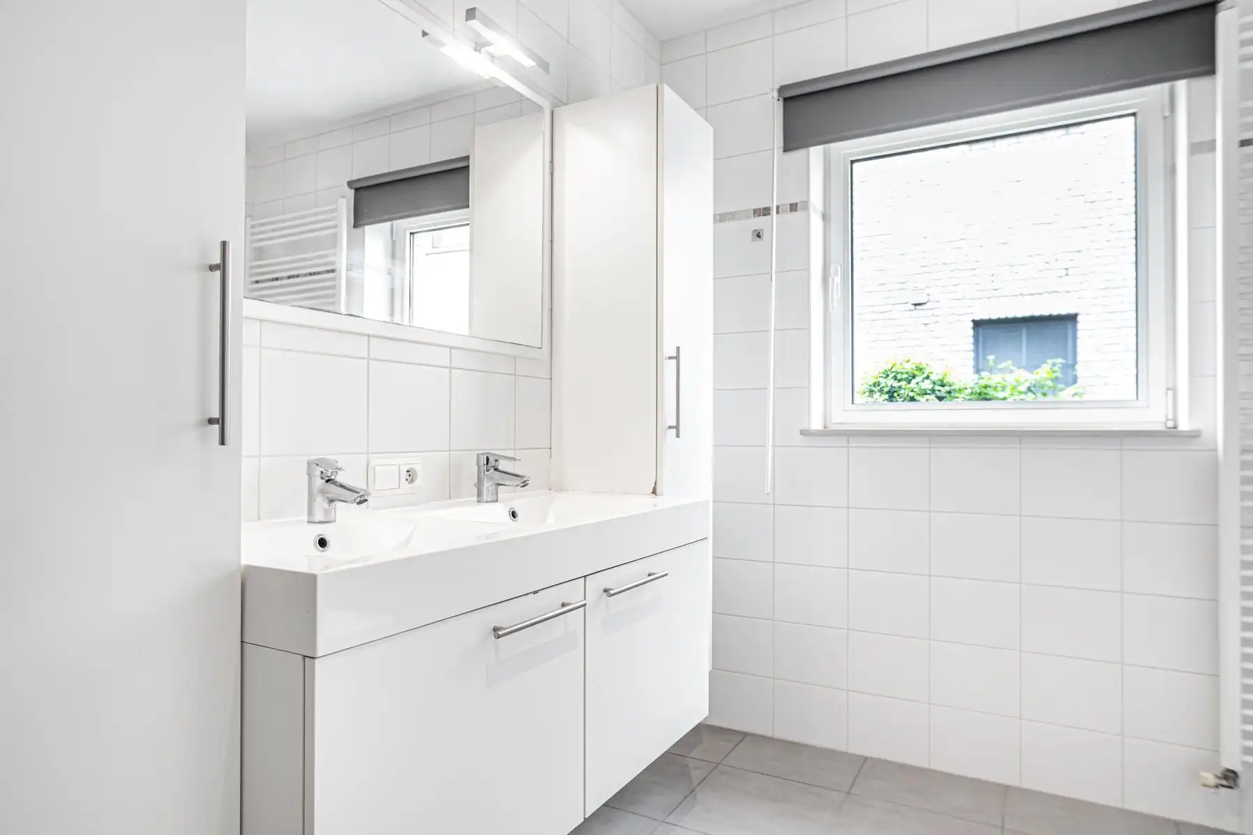 Instapklaar gelijkvloers appartement met privatieve tuin foto 13