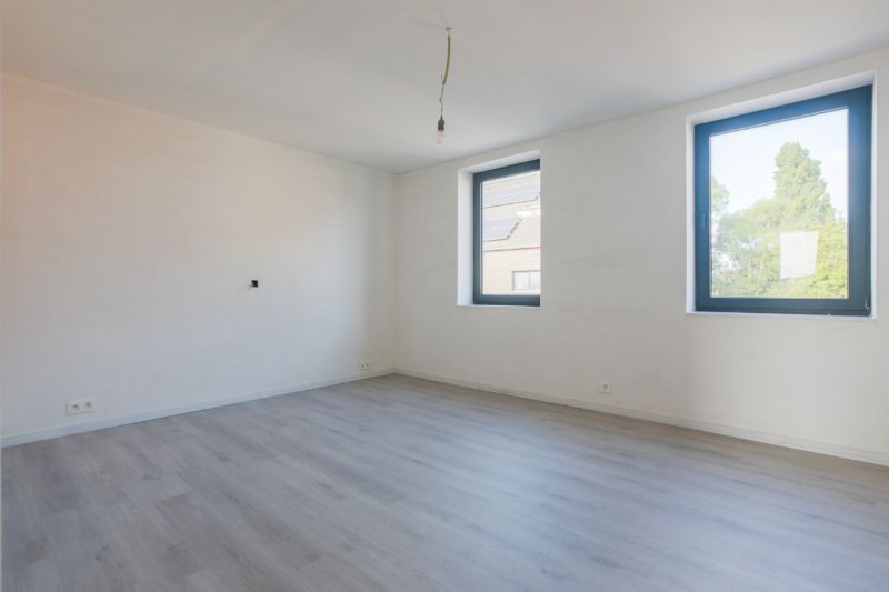 Volledig vernieuwde  woning op een boogscheut van "de Gavers" met 3 slaapkamers, ingerichte keuken, tuin met uitweg (garagemogelijkheid). Energielabel A foto 9