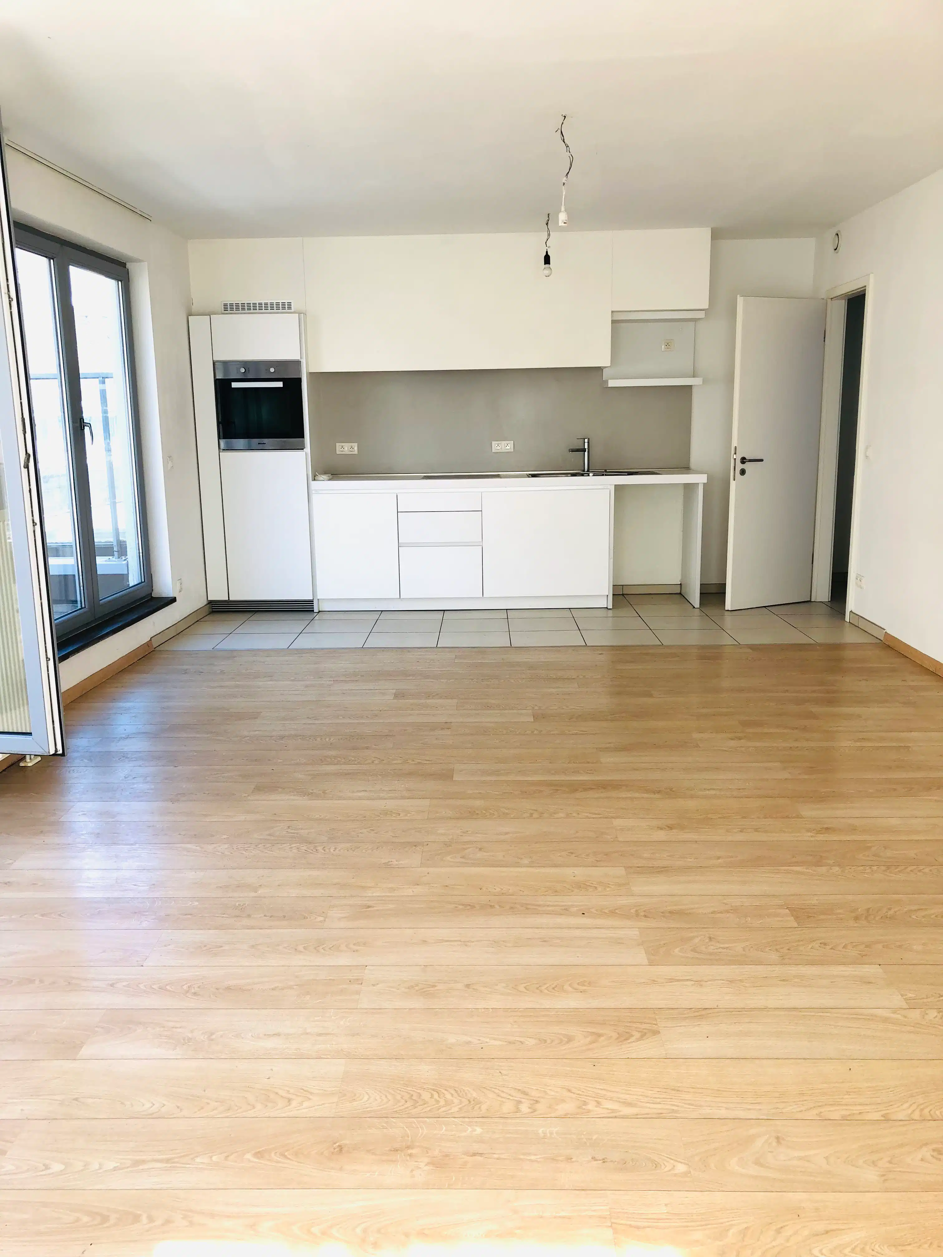 Trendy 2-slaapkamerappartement + ruim terras en staanplaats foto 2