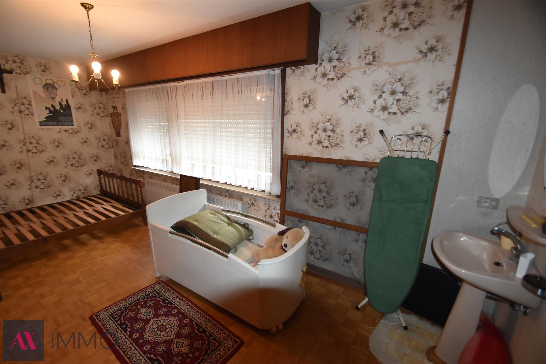 Centr. en rustig gel.woning met 3 slpk., gar., tuin en oprit op 4 are 80 ca foto 14