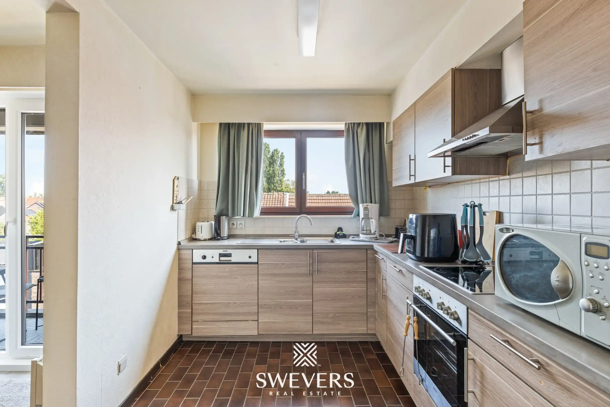 2-slaapkamerappartement van 94m² met garagebox in hartje Beringen foto 9