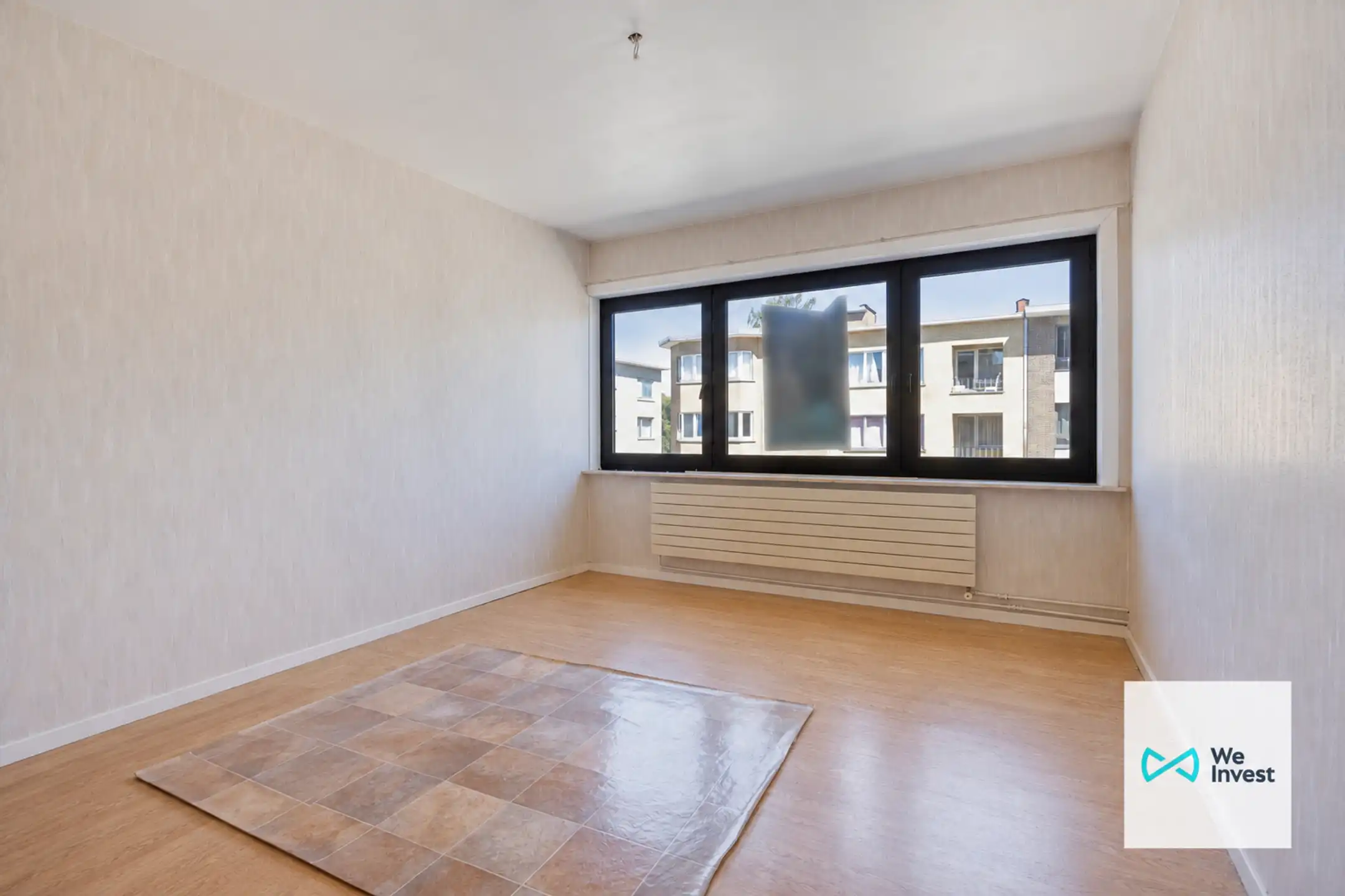 Ruim 2-slaapkamerappartement met balkon en binnenstaanplaats foto 9