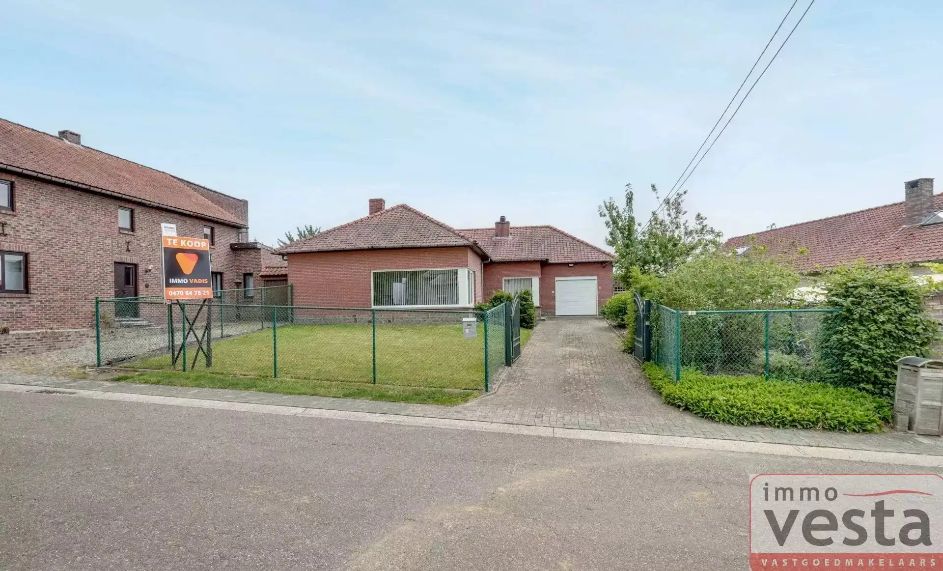 Bungalow met vier slaapkamers, inpandige garage en ruime tuin in Kortessem foto 21