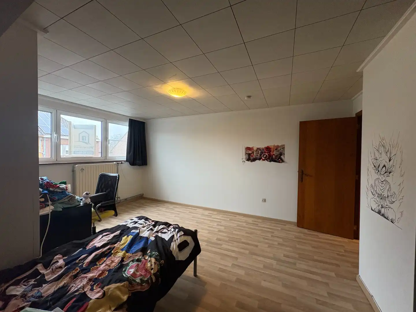 Ruime en gunstig gelegen gezinswoning met tuin foto 14