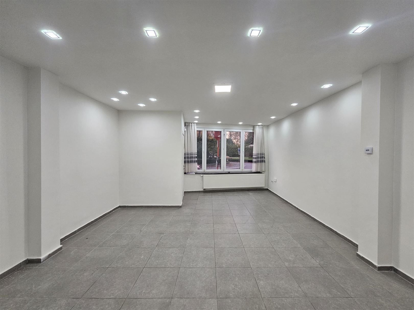 Gunstig gelegen ruime woning met stadskoer. foto 3