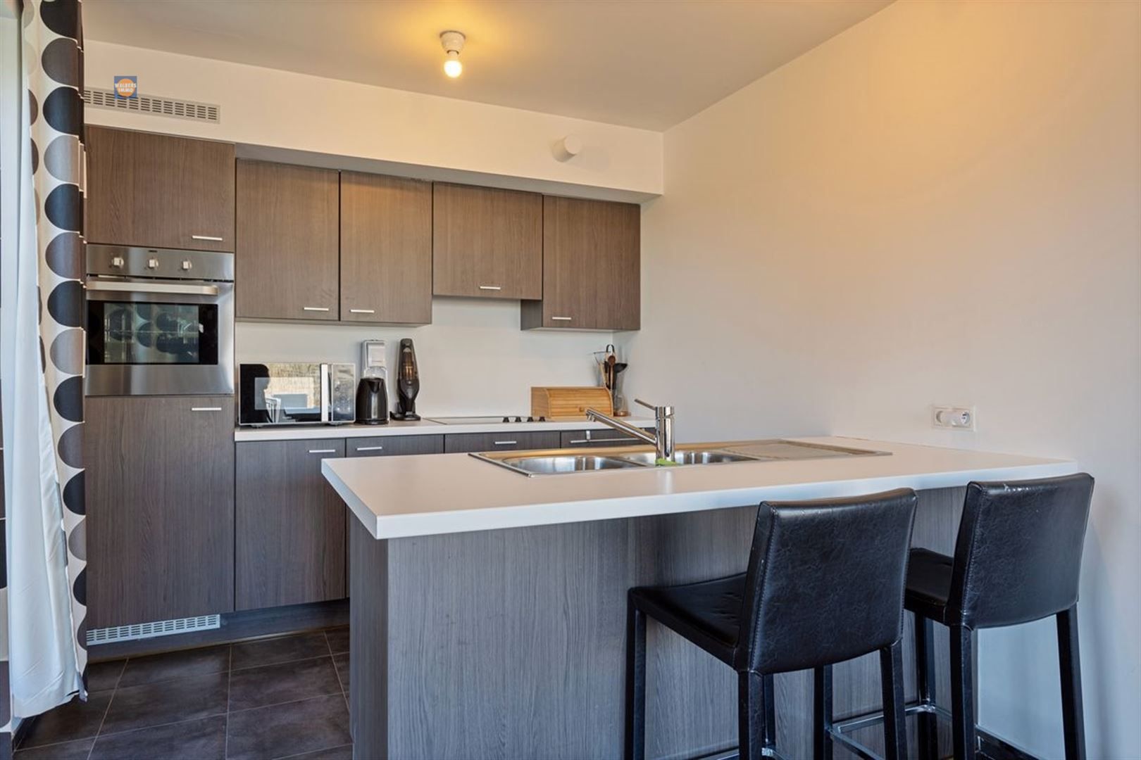 Modern appartement met ruim terras in een rustige woonwijk foto 3