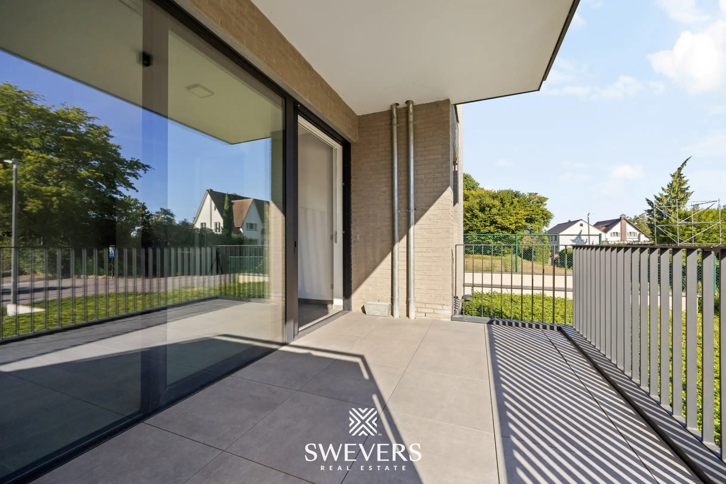Instapklare serviceflat met professionele uitbating door Ocura, terras, private berging en ondergrondse parking foto 14