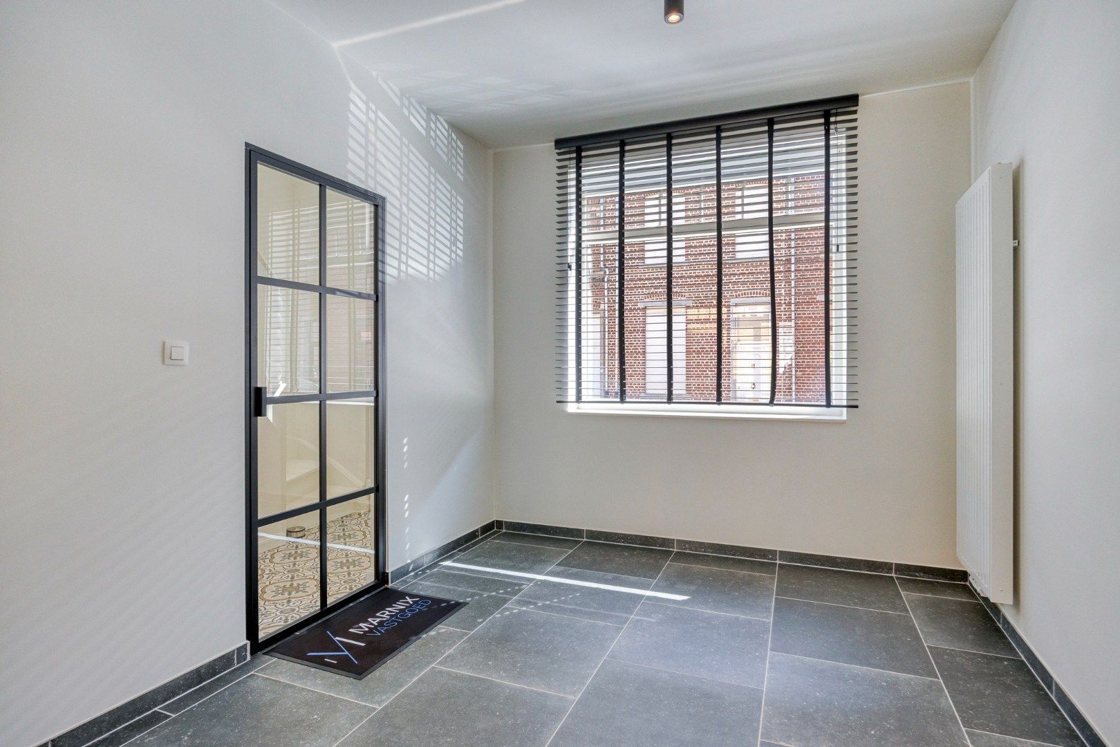 Totaal gerenoveerde woning met 4 slaapkamers en terras in het centrum van Leuven! – EPC 40 kWh/m² - bewoonbare oppervlakte 180 m²  foto 4