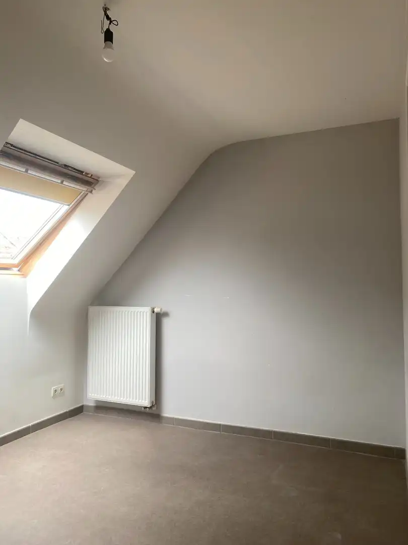 Verzorgd duplex-appartement met 3 slaapkamers en een autostaanplaats foto 9
