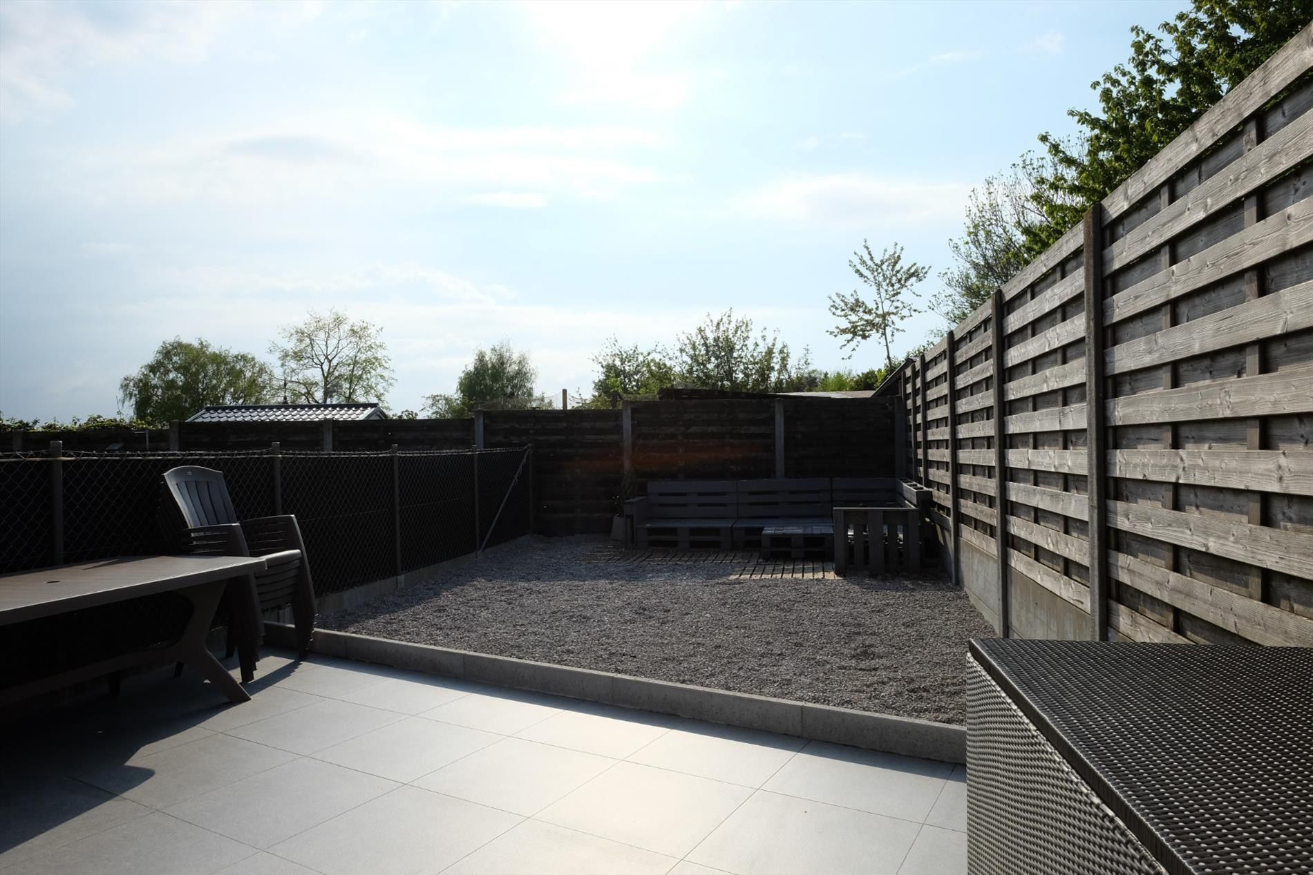 Recente rijwoning met garage foto 17