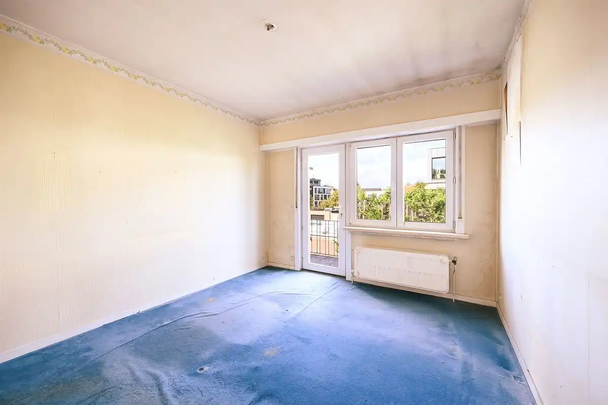 Lichtrijk te renoveren hoekappartement in hartje Brasschaat foto 20