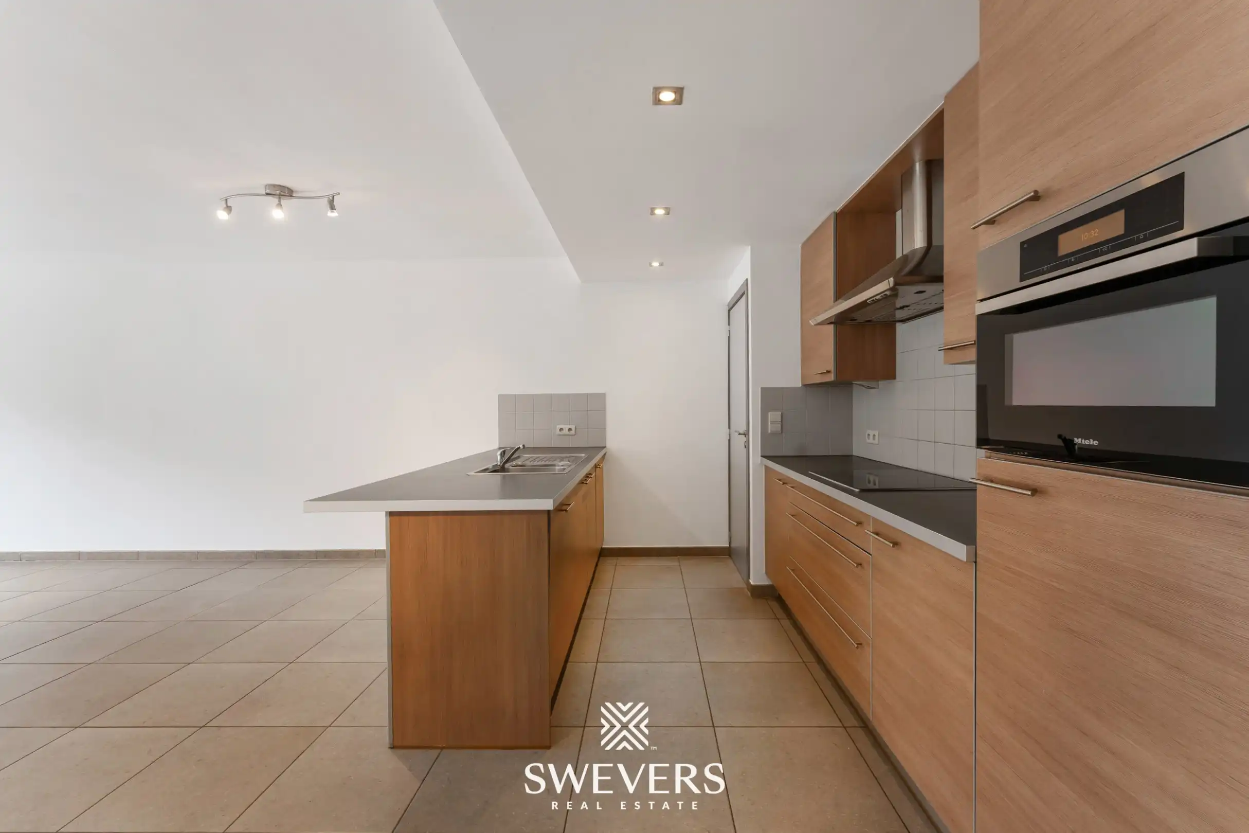 Ruim duplex appartement met 2 slaapkamers en tuin foto 6