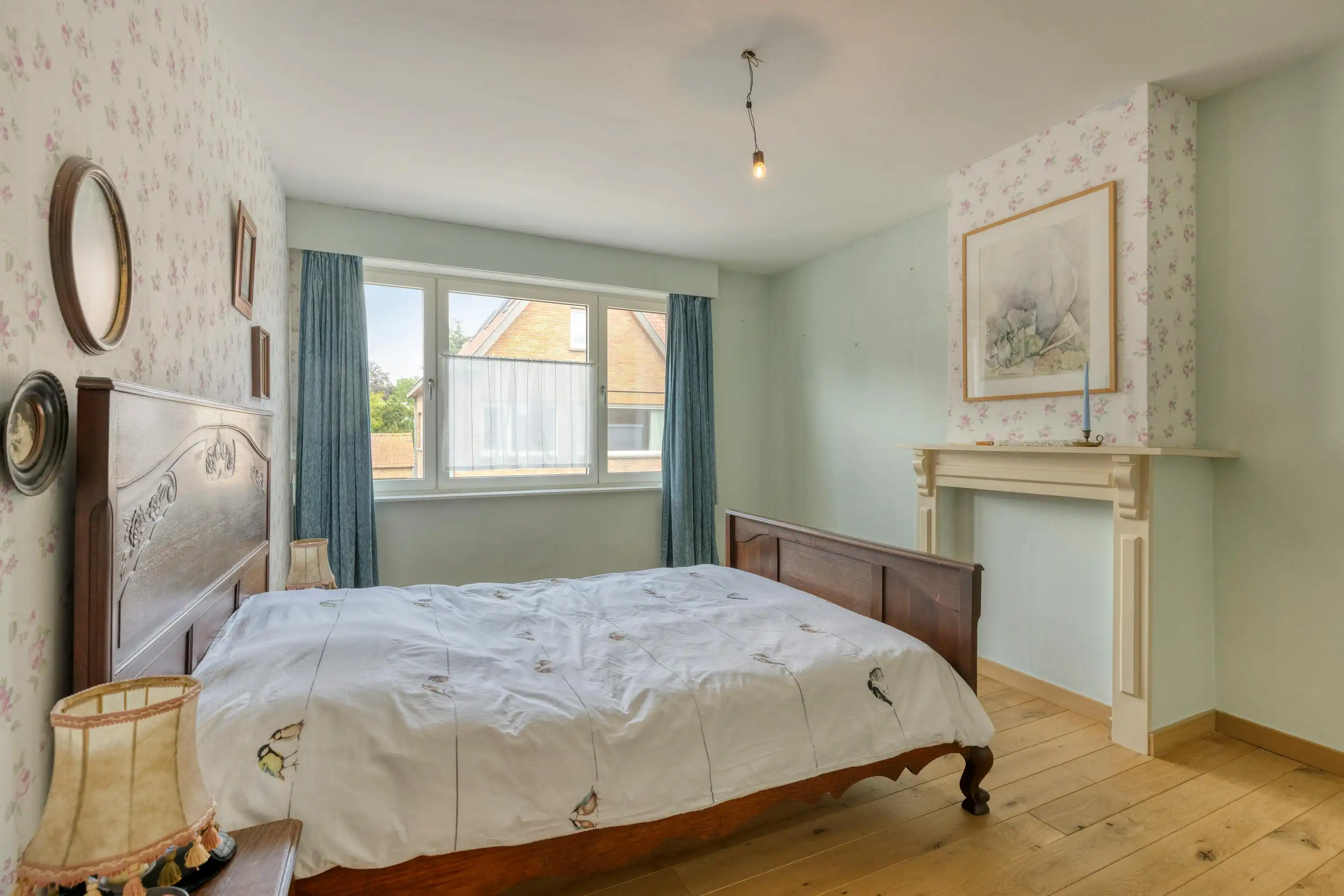 Halfopen huis met 3 slaapkamers, carport + tuin te Sint-Kruis foto 12