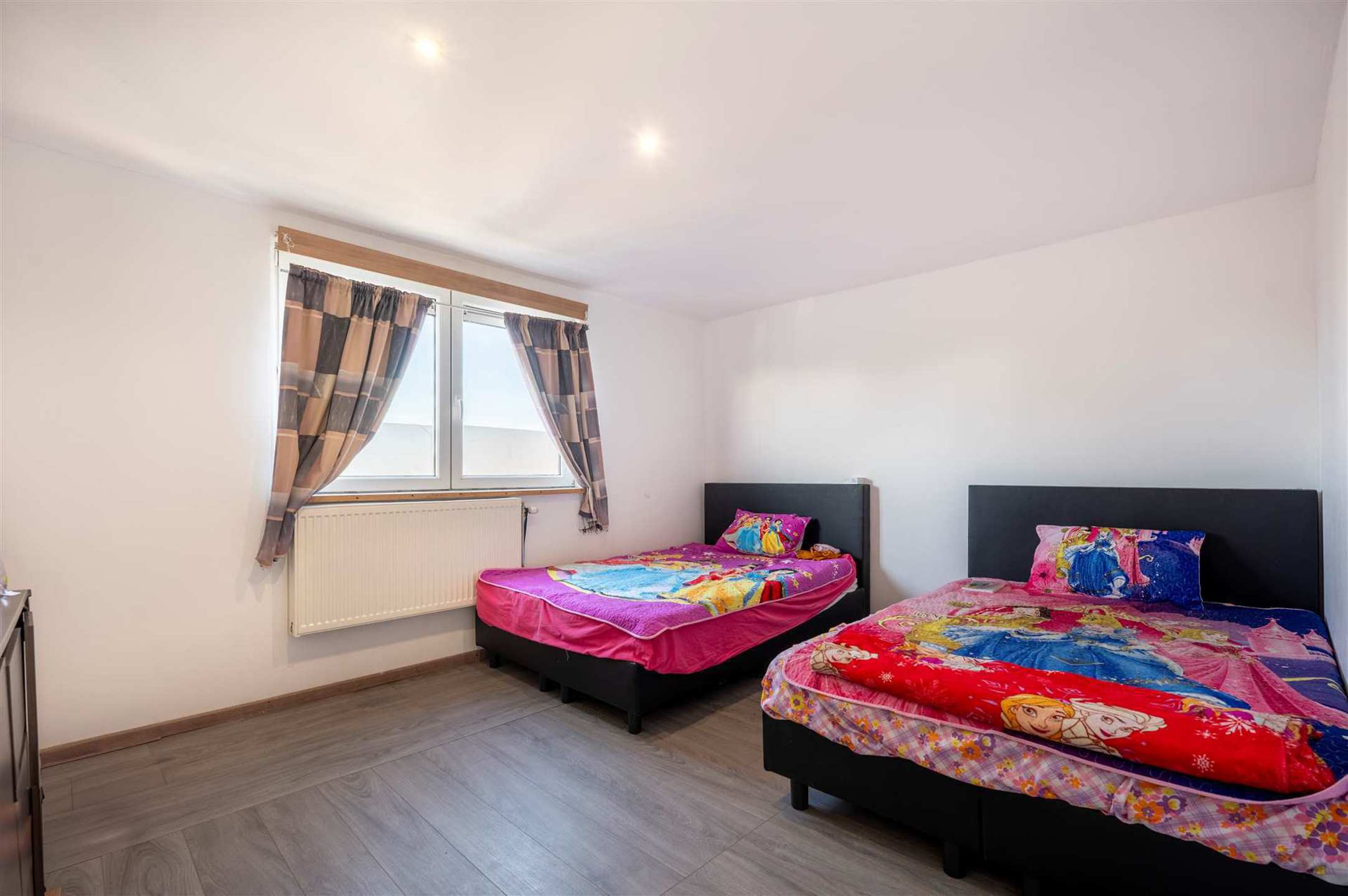 Woning met 4 slaapkamers en tuin op centrale ligging foto 2