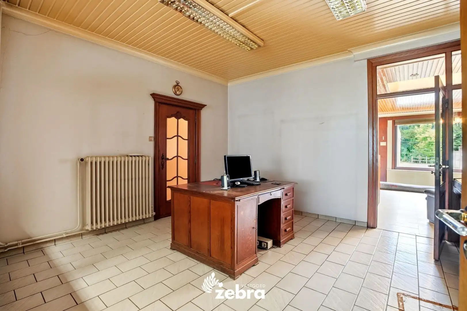 Ruime woning met 4 slaapkamers en tuin te Oostrozebeke! foto 5
