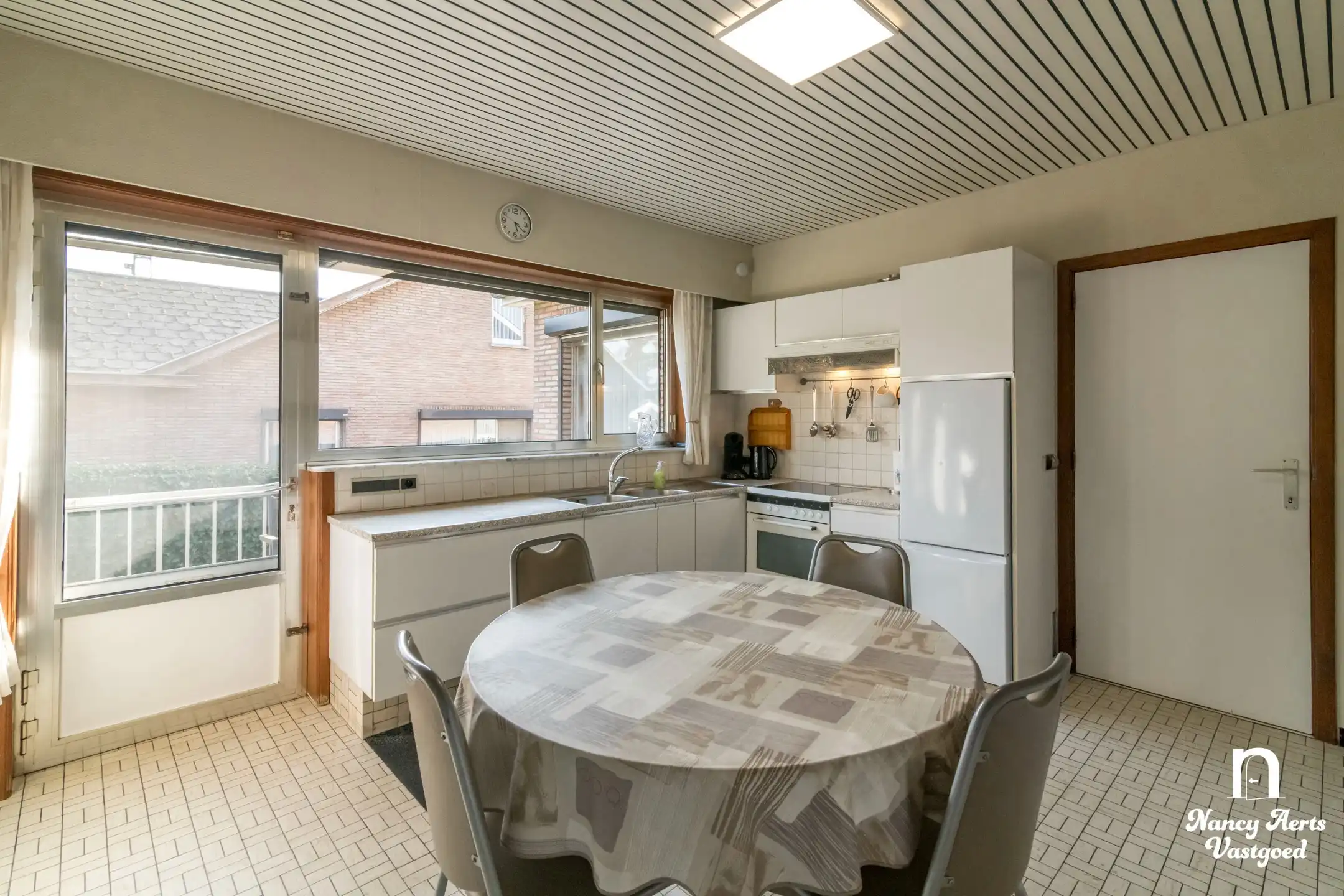 Goed onderhouden gezinswoning met grote tuin foto 18