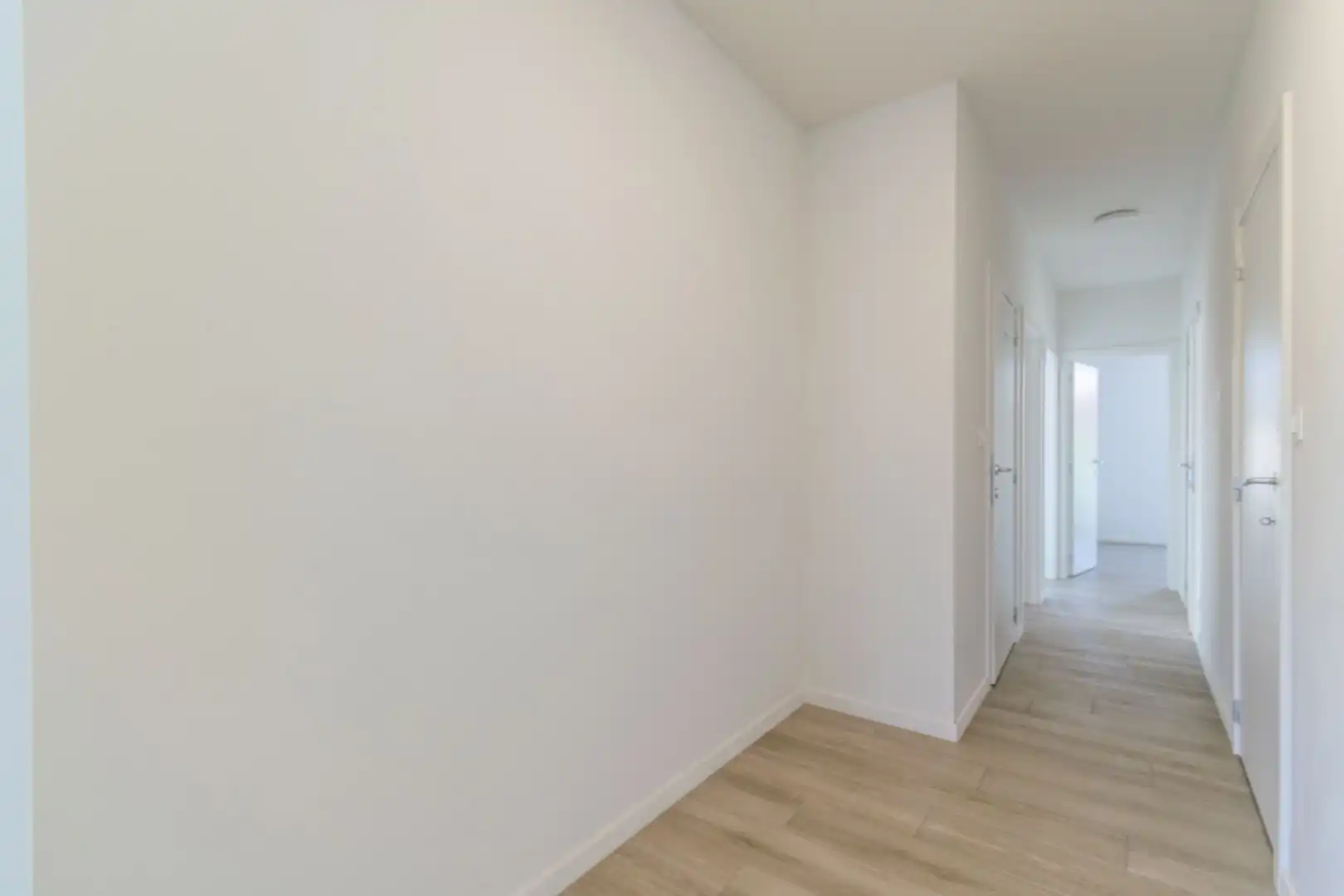 Een ruim (116m²), recent nieuwbouwappartement te Dilbeek! foto 13