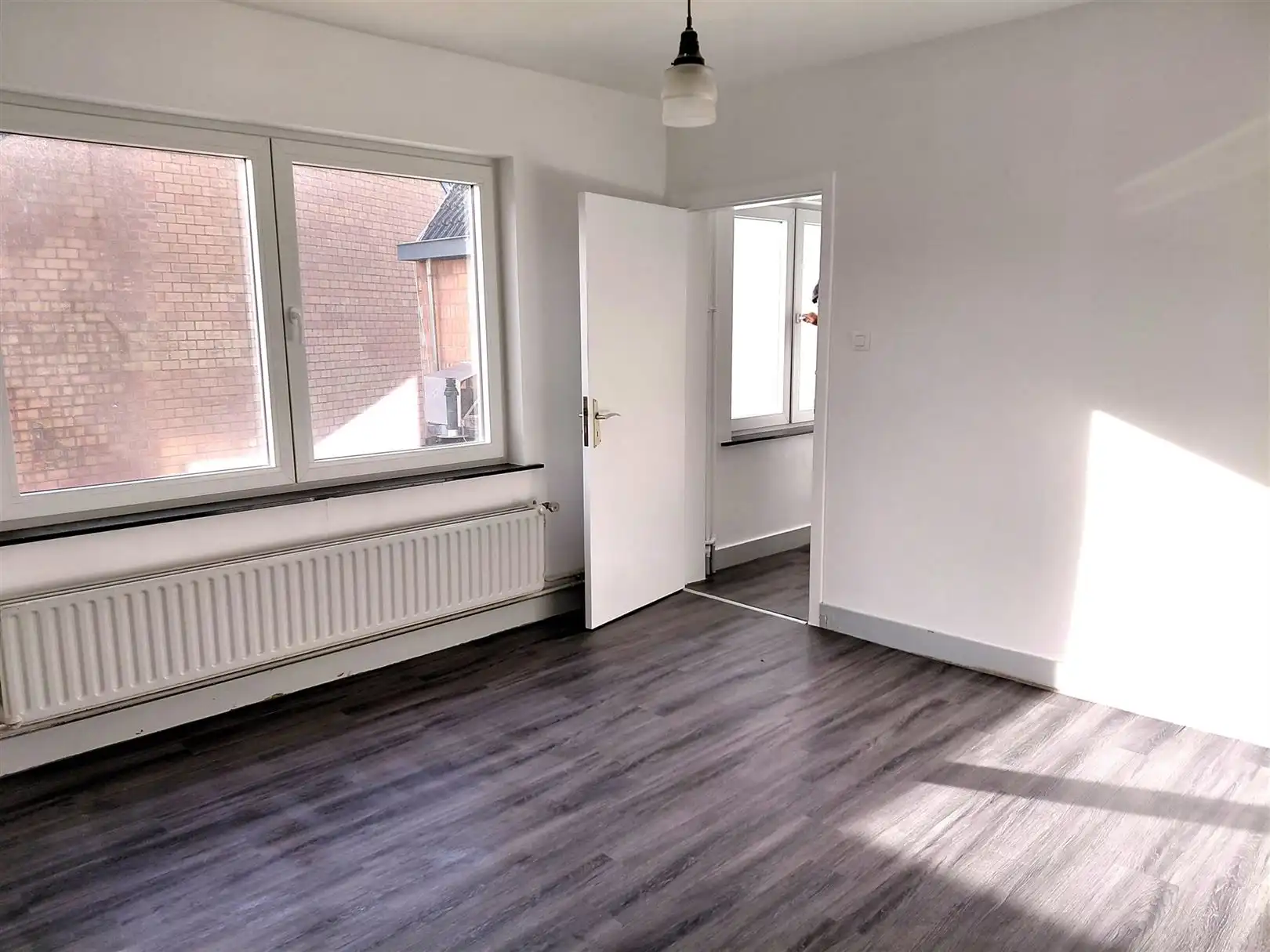 TE HUUR: Gesloten bebouwing met 2 slaapkamers in het centrum van Heusden! foto 15