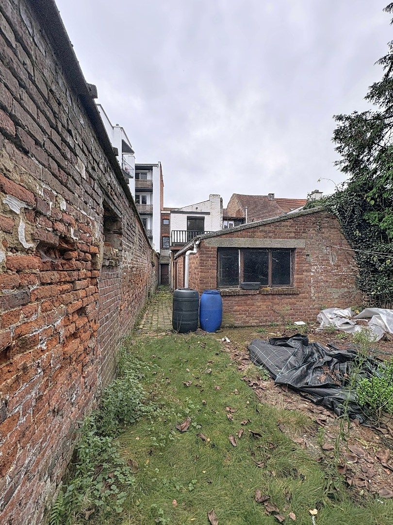 Charmant pand met handelsruimte en woonst in hartje Tienen foto 19