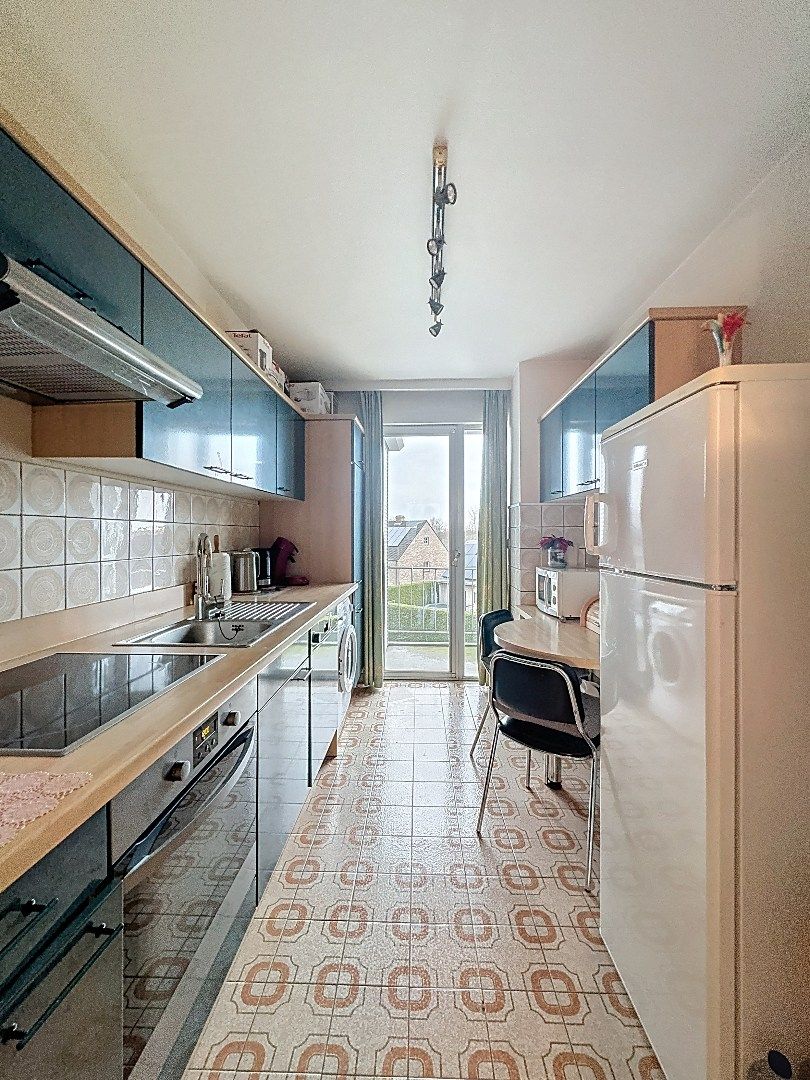 Ruim 2-slaapkamerappartement met terras, balkon, garage en berging foto 7