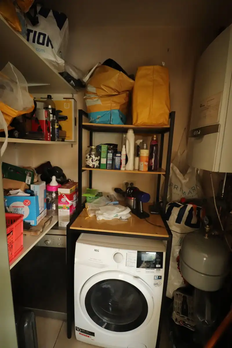 Ruim 2-slaapkamerappartement met lift, groot terras en ondergrondse autostaanplaats in het centrum van Baarle-Hertog foto 8
