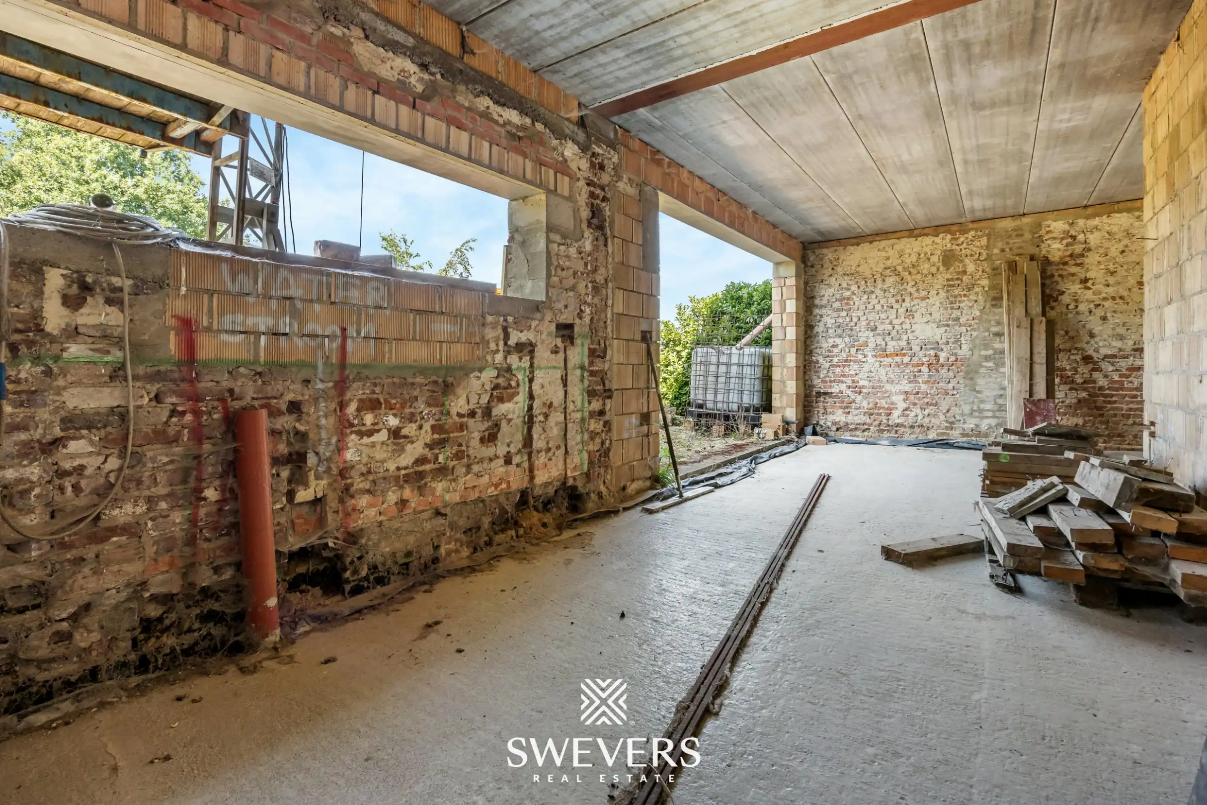 Open bebouwing met vergunde plannen op prachtig perceel van 1.610 m² in Kortessem foto 3