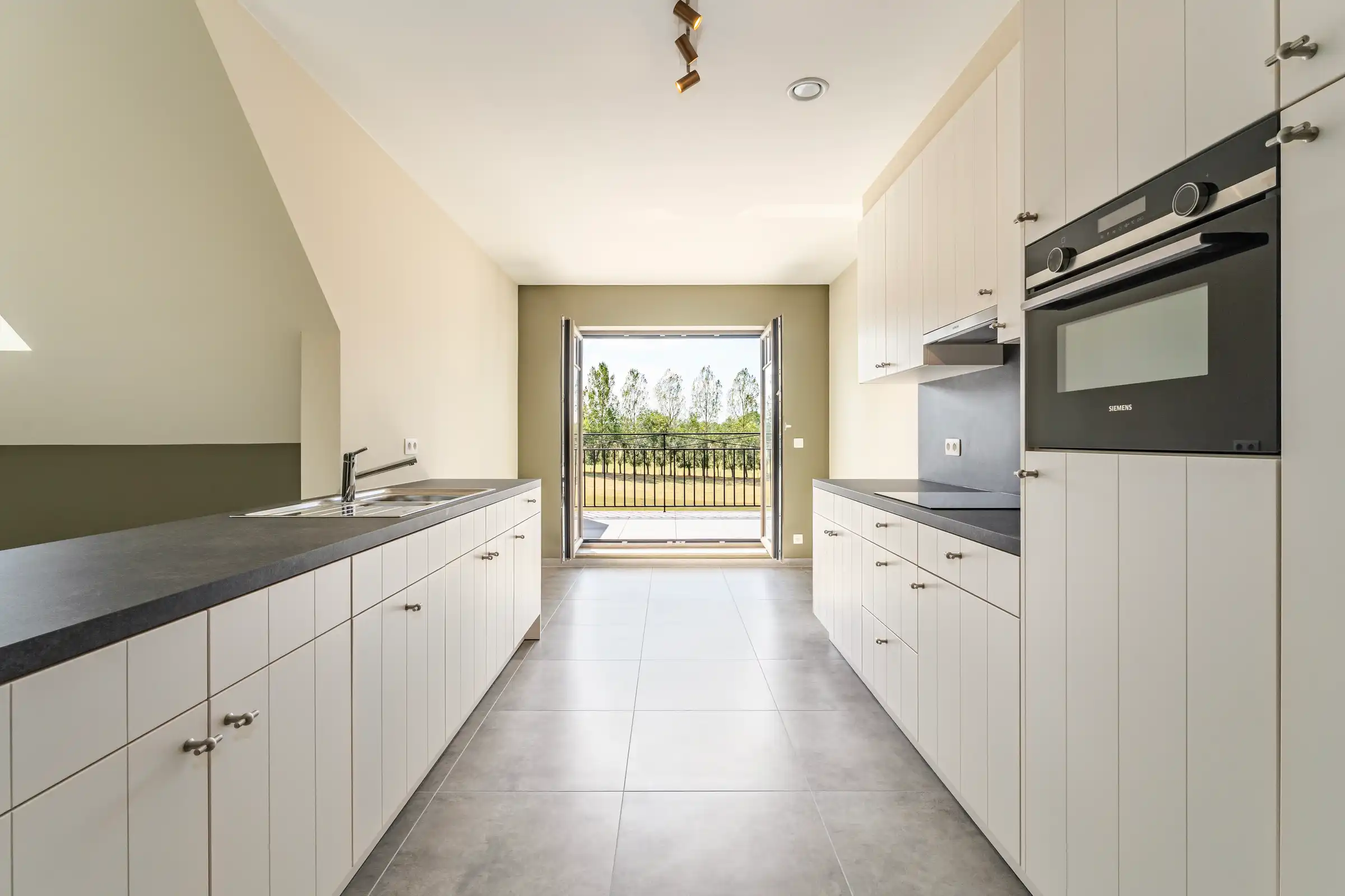Lichtrijk duplex villa-appartement met groen uitzicht foto 5