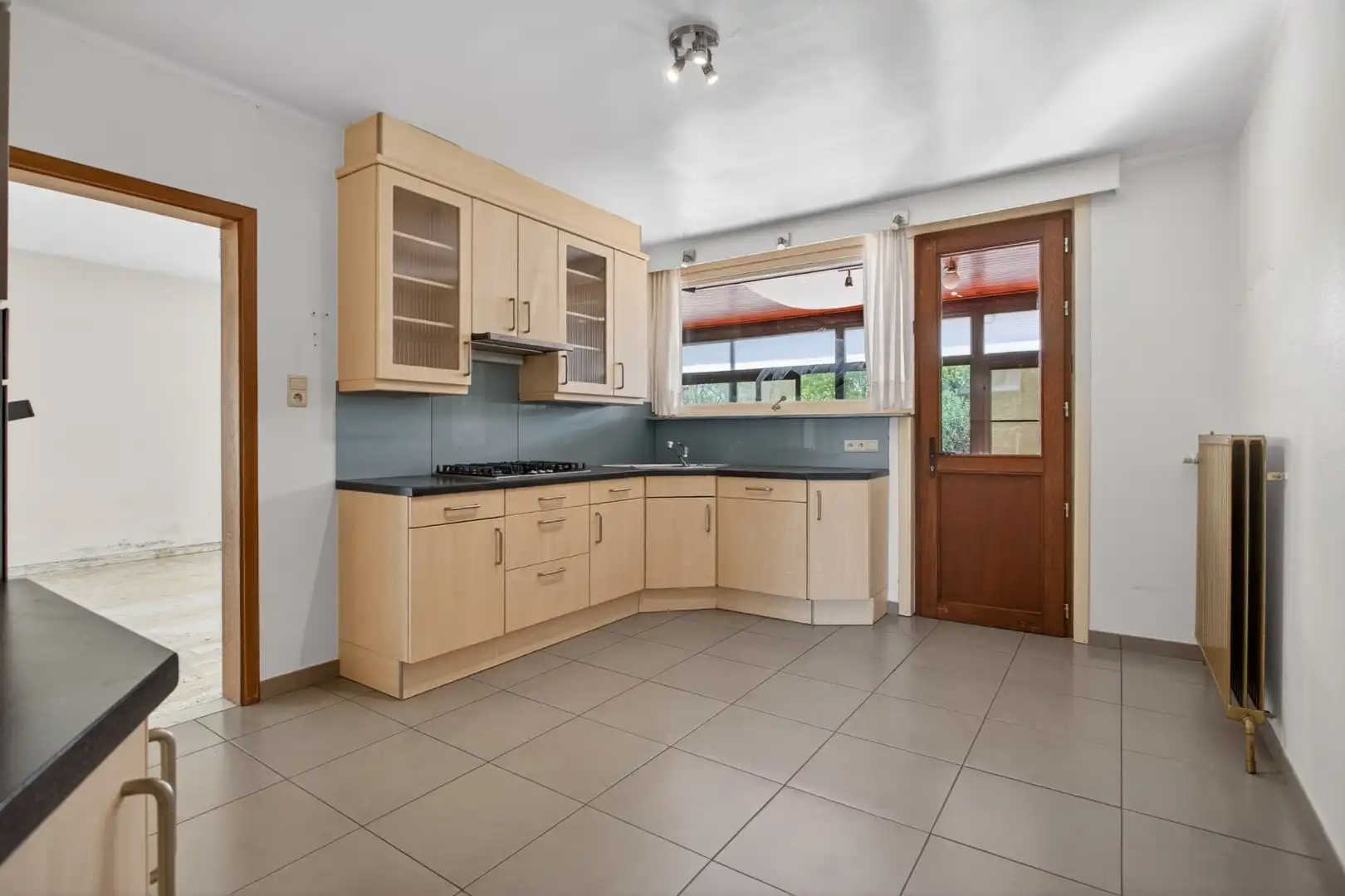 Ruime gelijkvloerse woning met veel potentieel op rustige ligging in Mol foto 17