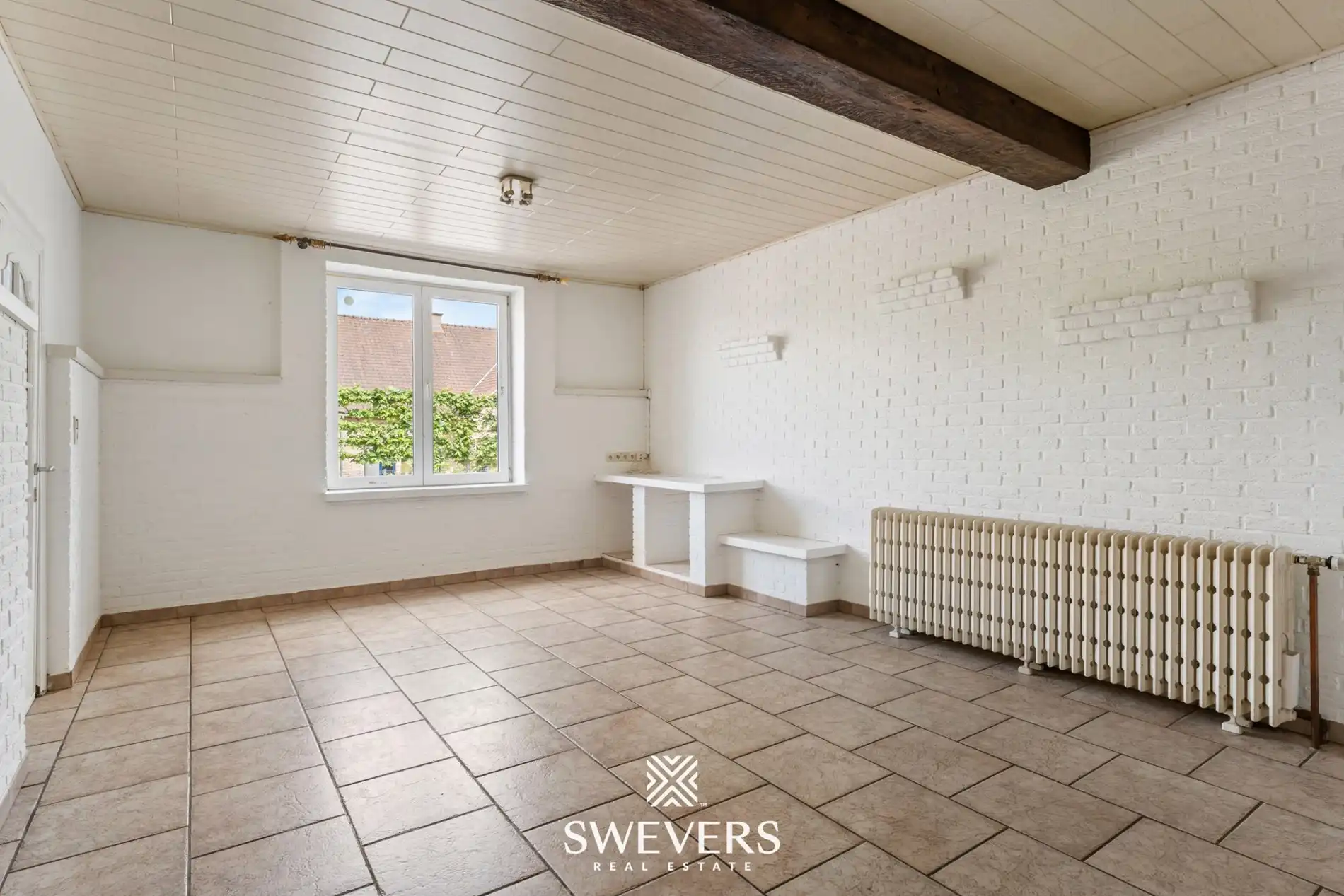 Charmante open bebouwing met 3 slaapkamers, zonnige tuin en renovatiepotentieel foto 4