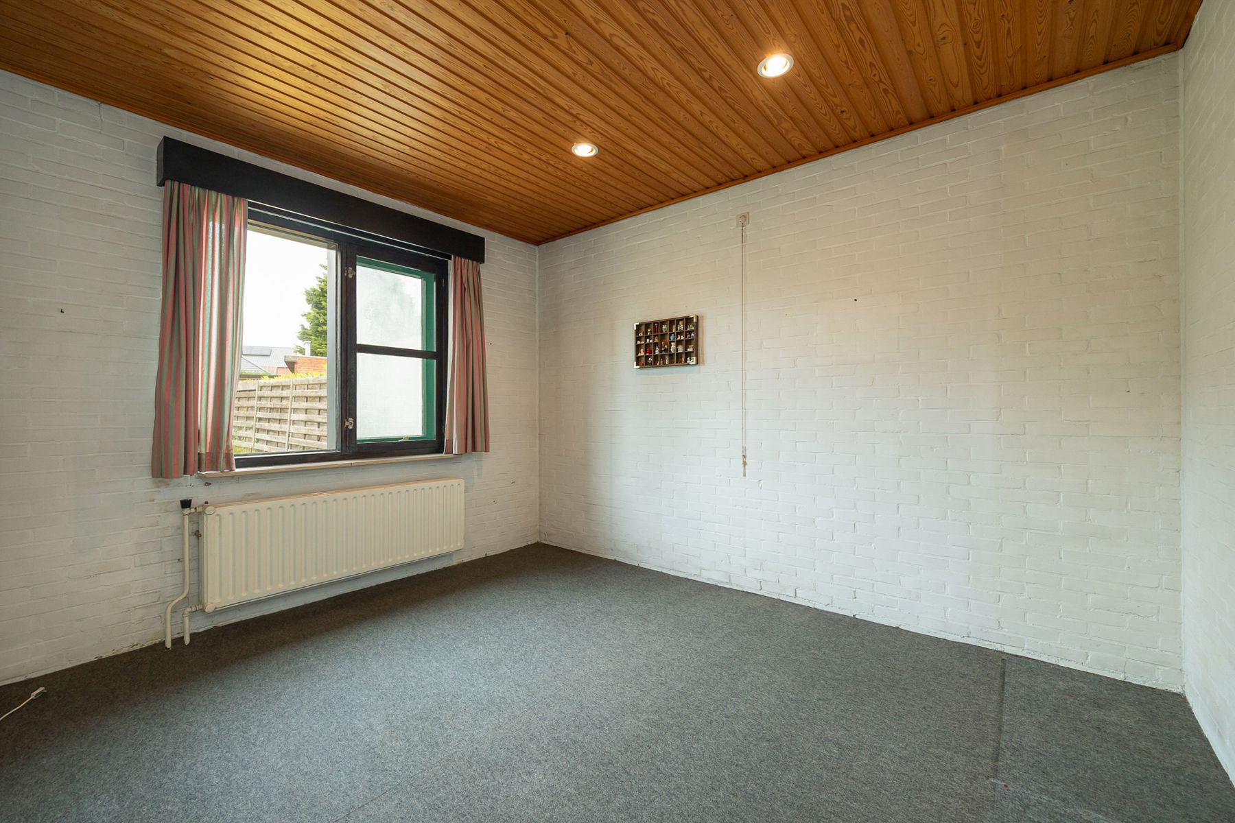 Laagbouwwoning met inpandige garage op een perceel van 561 m² in het centrum van Minderhout. foto 15