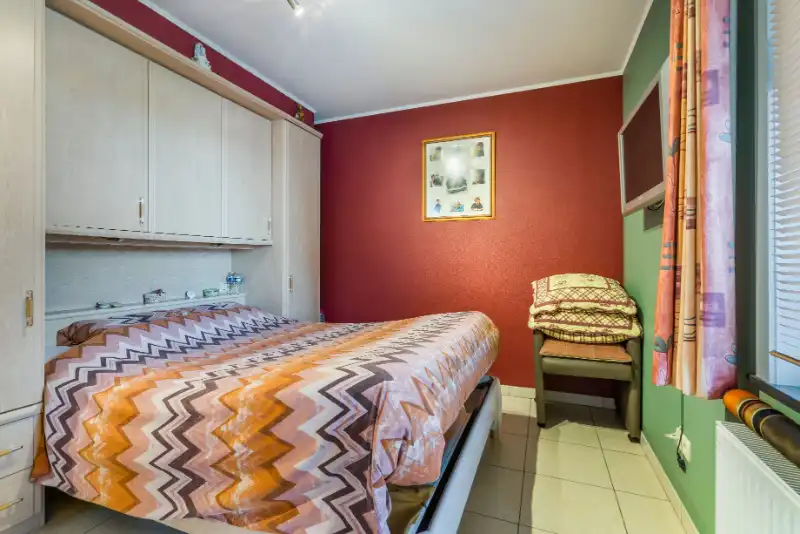 Dit uitstekend onderhouden appartement is zeer goed gelegen op een boogscheut van centrum Evergem. foto 9