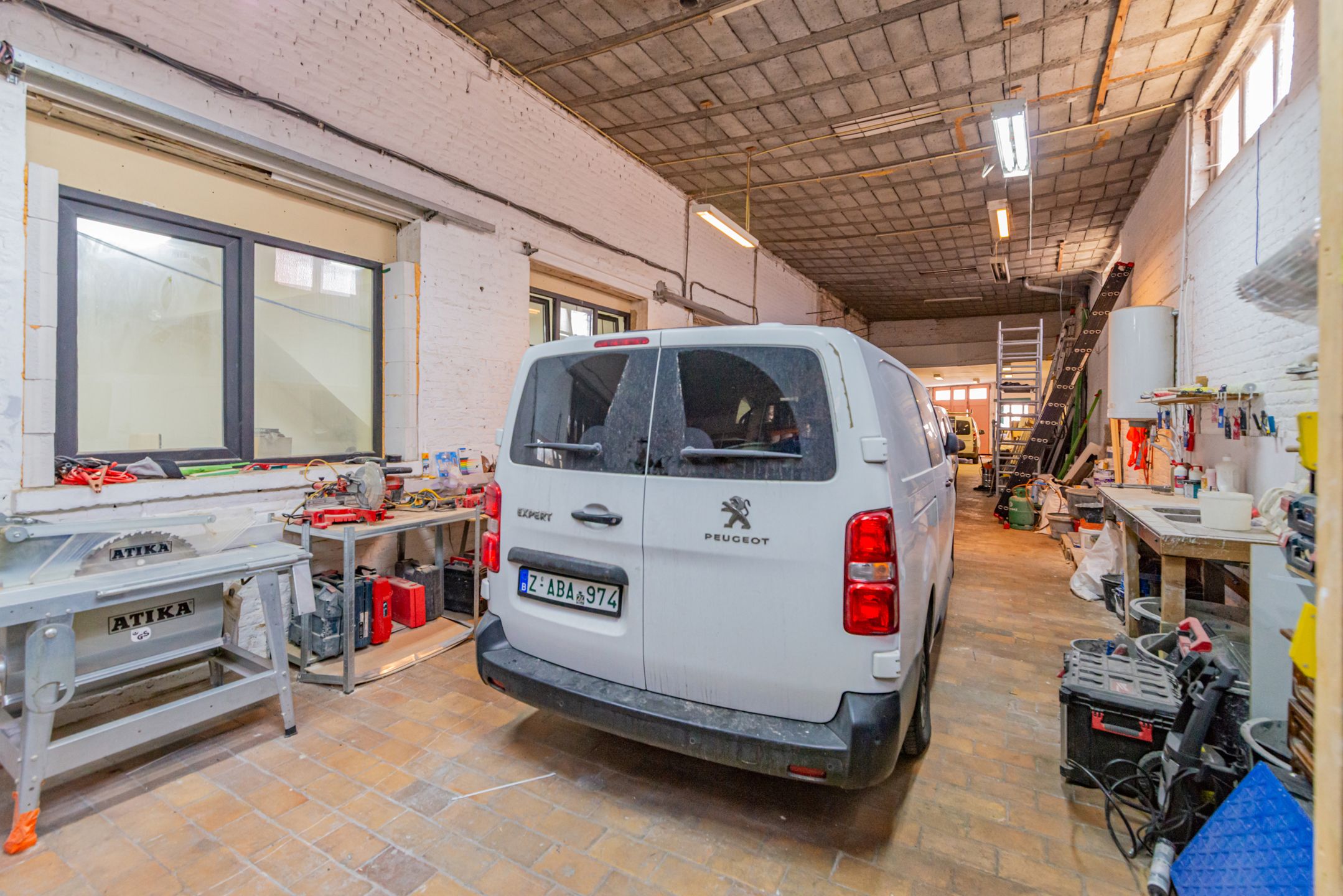 Opbrengsteigendom met 3 appartement + werkruimte foto 32