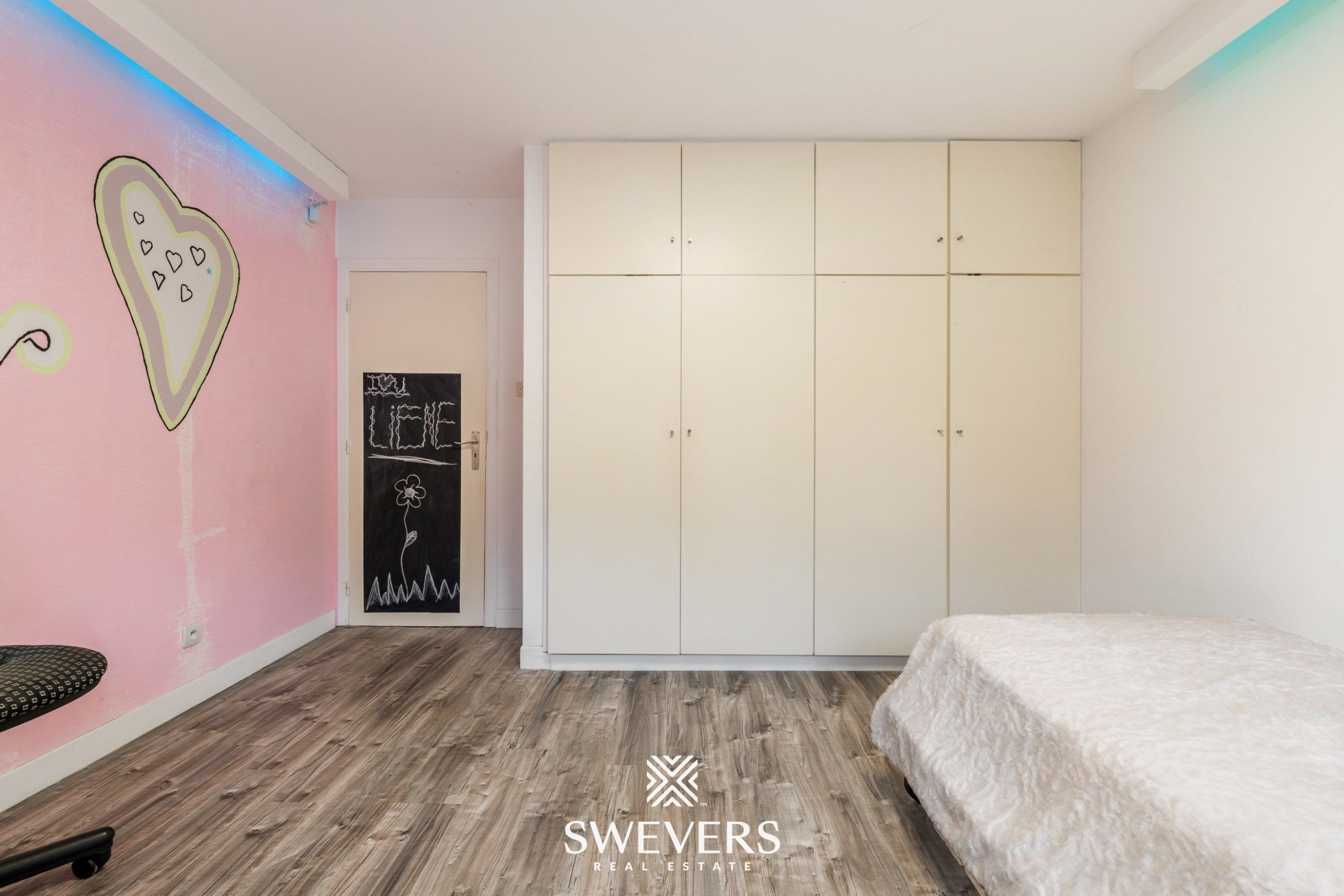 Instapklare gezinswoning met 3 slaapkamers, ruime kelder en zuidgerichte tuin in Beringen foto 22