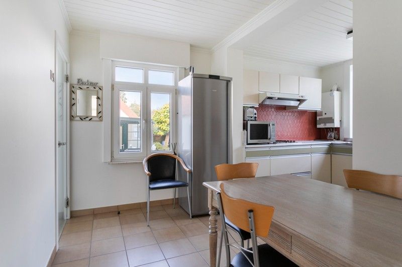 🏡 Uniek en authentiek pand vol karakter en mogelijkheden. Ruime woning, multifunctionele bijgebouwen en een charmante, omsloten tuin. foto 6