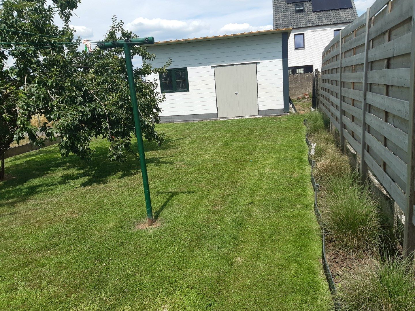 Praktische gezinswoning met leuke tuin. foto 33