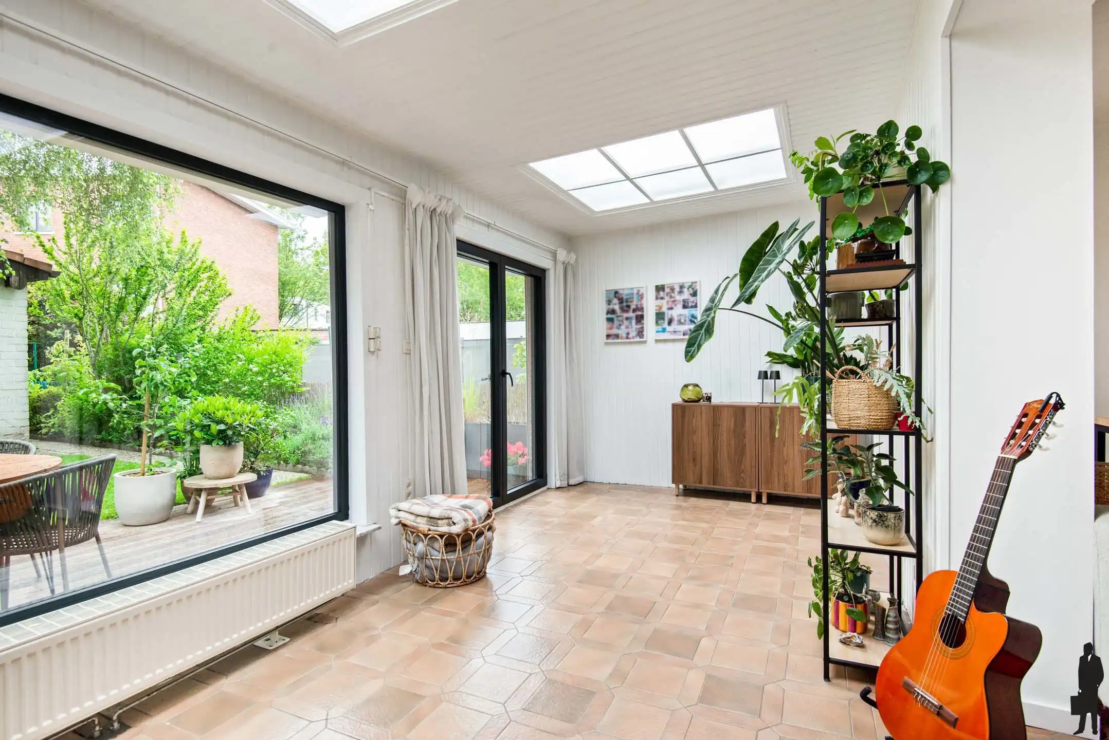 Instapklare gezinswoning met 3 slaapkamers en gezellige tuin foto 12